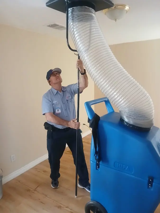 HVAC Installation technician using HEPA equipment in Wheaton